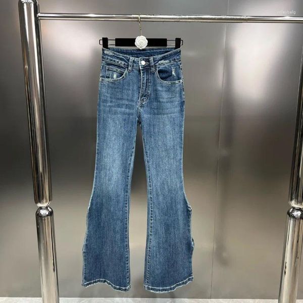 Jeans pour femmes ZCSMLL 2023 Printemps Hiver Les jambes du pantalon en denim légèrement retirées de manière irrégulière montrent le sweat-shirt européen américain femmes