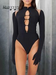 Jumpsuits de mujeres Rompers ahagaga Fashion Hollow Out Sexy Bodysuits Women Solid Regular Casual Long Slve Shule Slim Empers Strtwear Tops TS y240504