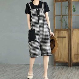 Les combinaisons pour femmes Rompers Cotton Jumps Courstes pour femmes Plaid surdimensionné Sauthato une pièce tenue Femmes Rompers Loose Mode coréenne Décline vintage Plays Curys Y240510