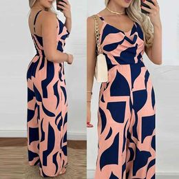 Jumpsuits femeninos Rompers Spring Elegant Print Sling Boho Mujeres Mujeres Sexy Slash Cuella Ruchada Playsuit recto de verano