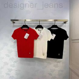 T-t-t-t-t-t-t-t-t-t-shirt de début de printemps Nouveau baume français style minimaliste avec une légère taille élastique et un pull rond à manche courte tricot tricot Ag1e