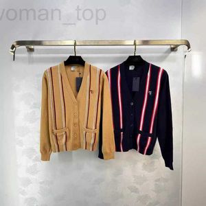 Tricot de tricots pour femmes concepteur printemps / été new pra nanyou gaoding loisir de style original de nuit colorée en V