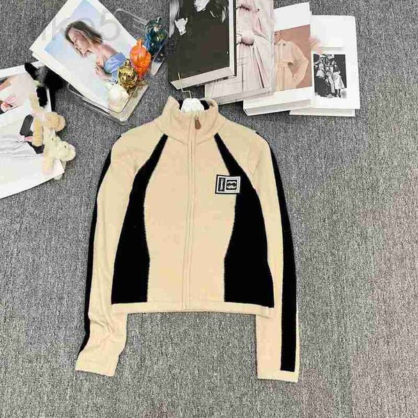 Puntos para mujer Camisetas Diseñador Xiaoxiangfeng 2023 Nueva imitación Mink Color Block Logotipo de cuero Letra Stand Up Collar Cremallera de manga larga Cardigan Suéter para mujeres K8UQ
