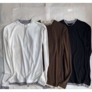 Tricot de tricots pour femmes du début d'automne conception de créneaux à la mode fausse chemise inférieure en deux pièces simple à la mode slim