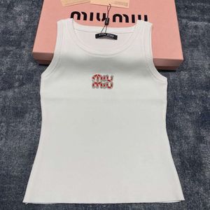 Traine de tricots pour femmes MM Famille 24 Début de printemps Nouveau fil de perle incurvé Versage à taquets en tricot tricoté