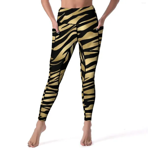 Leggings de mujer Pantalones de yoga con estampado de tigre negro y dorado Bolsillos Rayas de pieles de animales Medias deportivas de cintura alta sexy Leggins de fitness