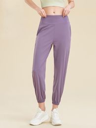 Leggings pour femmes poches de mode pantalons de Yoga amples taille haute pieds froncés vêtements de couleur unie décontracté course pantalons de survêtement longs femmes