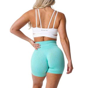 Leggings de mujer Nvgtn Celana Pendek Mulus Celana Pendek Spandeks Wanita Kebugaran Elastis Sejuk Hip-Lifting Rekreasi Olahraga Lari 822H