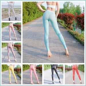 Leggings pour femmes Voir à travers la femme Gym Fit Pantalon de soie de glace Sexe en plein air Transparent Super Thin Vêtements Slips Culottes pour couple