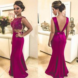 Vestidos de baile de recompensas de encaje con cuentas de Merma de Fucsia de mujer de mujer Rata de Soiree Satin Sexy abre los vestidos de fiesta formales de la parte del piso de espalda abierta con arco