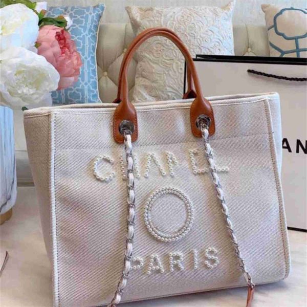 Sac de plage en toile classique de mode de luxe pour femmes grande capacité petits paquets de chaîne grands sacs à main VL8N sac à main de créateur vente en ligne