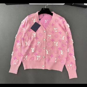 Einreihiger Strickpullover mit V-Ausschnitt und rosafarbenem Logo für Damen im neuen Design aus Jacquard mit Blumenmuster und Mantel SMLXL