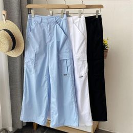 Pantalones de mujer 2023 Primavera/Verano Hombres y casual Color sólido suelto Multi bolsillo Trabajo de pierna ancha