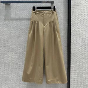Pantalon féminin 2024 Design de mode longues femmes hautes hautes taies plissées entièrement appariées pantalon en vrac
