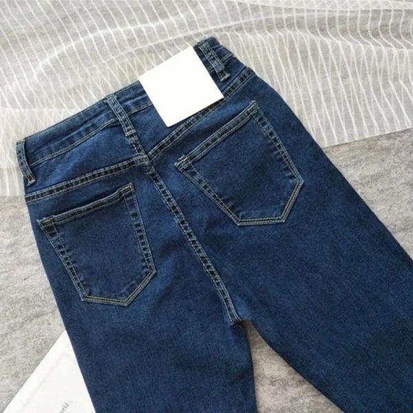 Pantalones de mujer botón cremallera jeans para mujeres lápiz con estilo de mezclilla de mezclilla delgada a mediana edad con bolsillos elásticos para yoga
