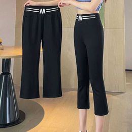 Damesbroeken capris 2023 Nieuwe zomer casual Koreaanse letter patchwork elastische taille flare dames mode losse kleur rechte vrouwen kleding slanke y240422