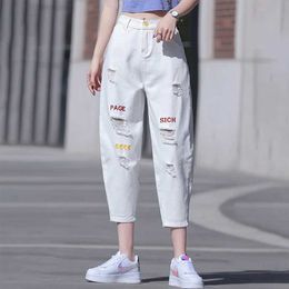 Damesbroeken capris 2023 Nieuwe zomerse mode trend hoge taille knop zak geborduurde geperforeerde jeans casual losse solide negen gesplitste harlan broek y240422