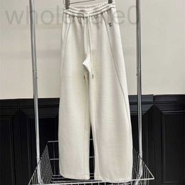 Pantalones para mujer Capris Designer 24 Principios de primavera Nuevo Nanyou Miu Casual Versátil Letra Bordada Cordón Elástico En forma de pera Cintura alta Pierna ancha D79G