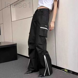 Pantalon pour femmes Capris Designer Brand Workwear Ligne droite avec des embellissements en métal sur les deux côtés Poches et ouvertures à glissière à l'ourlet polyvalent