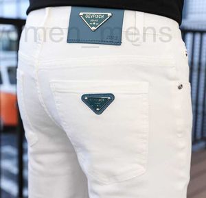 Damesbroeken Capri ontwerper Xintang Nieuw product Witte jeans voor heren Europese goederen Lente/zomer Slim Fit Kleine voeten Elastisch Casual Crop Trend VD0E