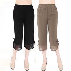 Damesbroek capris dames casual Koreaanse veter vaste kleur chiffon elastische taille brede poot broek zomer simplicity hoge taille kalf lengte broek y240422