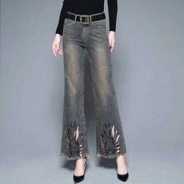 Pantalon féminin Capris Design d'origine Broidered Jeans Femmes Femmes hautes Bouton d'automne Pocket Zipper lavé blanchi Do Old Loose Loose Straight Flare Pants Y240504