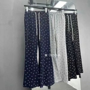 Damesbroek capris gedrukt glimlachende gezicht wijd been broek dames lente kleding elastische taille losse casual broek recht y240429