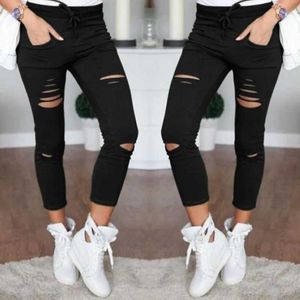 Damesbroek Capris scheurde jeans voor vrouwen vrouwelijke grote grootte gescheurde broek stretch potlood broek leggings dames jeans 2023 nieuwe Y240422