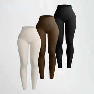 Pantalon féminin Capris Solid Long Leg Fomens Pantalon en tricot sans taille avec une taille haute et des fesses pour améliorer les jambes sportives à la mode à la mode à la mode Q240508