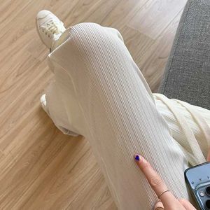 Pantalon féminin Capris Summer Thin Ice Ice Silk Pantalon à jambes larges Femmes Summer High Elastic DrawString Drape Loose White Straight Casual Pantals Y240509