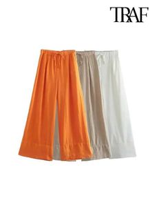 Pantalon féminin Capris Traf Fashion Fashion Side Pocket Linen large Pantalon de jambe Vintage haute taille élastique avec cordon de cordon pour femmes sans imprimé bon produit y240422