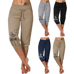 Pantalon féminin Capris Femmes Pantalon cultivé Haute taille élastique Trache à cordon Poches Dandelion Impression Femmes Pantalon sportif décontracté Strtwear Y240422