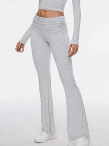 Pantalon féminin Capris Femmes Pantalon évasé décontracté Low Waited Slim adapté à l'élasticité solide 2024 T-shirt Spring / Sum