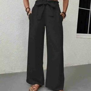 Pantalon féminin Capris Fashion Version Fashion avec un pantalon de jambe droite à la taille liée à la taille de couleur massive pantalon large pantalon y240528