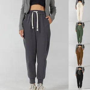 Pantalon féminin pantalon sportif sportif d'automne et vent d'hiver avec les pieds fermés hauts et pantalons lâches épaissis