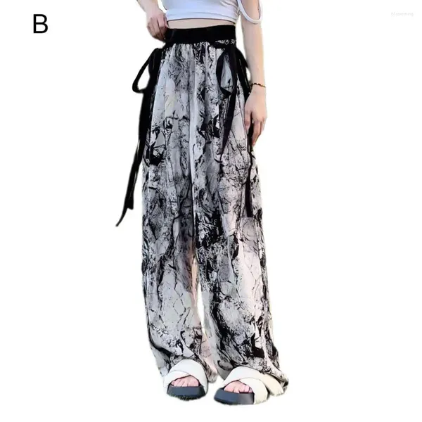 Pantalon de femme en mousseline de soie en mousseline de mousseline à la jambe chinoise Impression en bambou à l'encre avec décoration de streamer pantalon d'été pour femmes