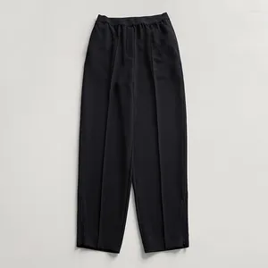 Pantalon féminin confortable Drape crêpe pieds avec des fentes latérales taille élastique de la taille médiane décontractée pour les femmes printemps et automne