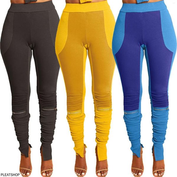 Pantalon féminin Vêtements américains européens Petites bandes de stand contrastées Couleur épisser la fermeture à glissière décontractée Sports Slit plissé Pile