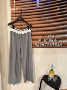 Pantalon féminin Version coréenne Wide-Leg Pantalon pour femmes 2024 Sentille de conception de taille haute et d'été.