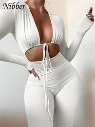 Damesbroeken Nibber Zomer Sexy Jumpsuit V-hals Lange mouw Vrouwelijke Bodycon Hol Jogger Clubwear Lichaamsvormende Jumpsuits 231018