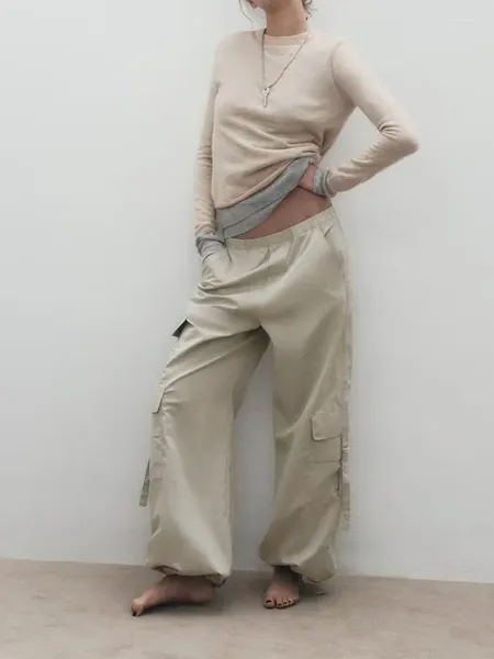 Style de pantalon pour femmes, dos avec poche de garniture, Patch de jambe, sangle de voyage, ourlet à pression, parapluie en Nylon réglable