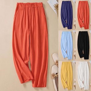 Pantalones de mujeres de verano lino casual elástico cintura alta hendidura suelta recortada con bolsillos
