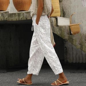 Pantalon féminin l'été décontracté couleurs à crampon élastique pantalon de taille élastique broderie de fleur de mode lin en coton
