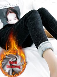 Pantalones de mujeres Jeans de vellón espeso Cargo de cintura alta al estilo coreano Slim apretado Velvet flaco pantalones térmicos