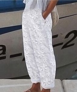 Pantalon féminin vintage mujer femme blanc broderie printemps été décontracté chic tunique élastique de taille en dentelle pantalon