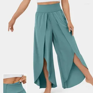 Pantalon féminin Femmes hautes taies larges de yoga de jambe de yoga grande taille plage boho divisé pantalon ample élastique solide mince