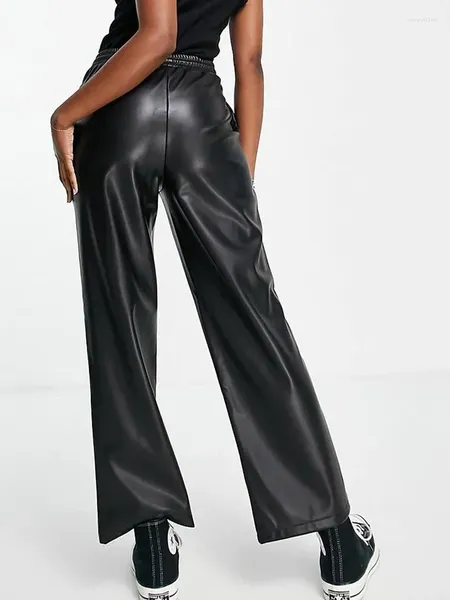 Pantalon féminin Femmes Matte fausse en latex en cuir haute taille cordon de trémet lâches dames put épisser le pantalon de jambe large.