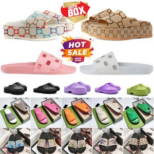 Designer Sandalen Slippers Zomer Heren Dames Schoenen Vormig Veelkleurig GG Flora Slides Gegoten voetbed in zwarte tonale rubberen zool met reliëf aan de buitenkant