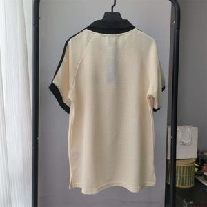 Chemise féminine printemps / été Nouveau t-shirt classique de cou de polo décontracté à manches courtes à la gaufre 3145