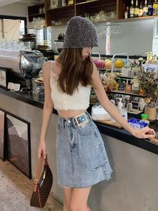 Shorts pour femmes 2023 à la mode gros Mm déchiré taille haute Denim jupe courte femmes Design sens été mince sac hanche a-ligne